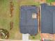 Aerial view of the home showcasing the roof, backyard patio, and landscaping at 405 Newstyle Way, Gastonia, NC 28056