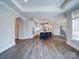 Spacious open concept kitchen with an island and modern white cabinets at 405 Newstyle Way, Gastonia, NC 28056