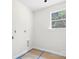 Laundry room featuring hookups and a bright window at 415 Dogwood Ln, Statesville, NC 28625