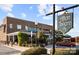 Afton Tavern features a brick facade, outdoor seating, and a charming street presence at 5001 Grand Canyon Nw Rd, Concord, NC 28027
