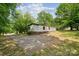 Charming single-Gathering home with a long driveway and surrounded by lush trees at 5001 Grand Canyon Nw Rd, Concord, NC 28027