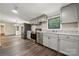 Spacious kitchen with stainless appliances, adjacent dining area, and ample sunlight through windows at 5001 Grand Canyon Nw Rd, Concord, NC 28027
