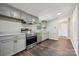 Updated kitchen features stainless steel appliances, and a window over the sink at 5001 Grand Canyon Nw Rd, Concord, NC 28027
