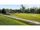 Picturesque park with open green space, picnic areas, playground, and recreational amenities at 5001 Grand Canyon Nw Rd, Concord, NC 28027