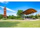 Picturesque park features a stage, open lawn and a distinctive brick tower with beautiful blue skies above at 510 Wiley Ave, Salisbury, NC 28144