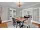 Dining room boasts a wooden table, stylish chairs and seamlessly connects to a living area at 510 Wiley Ave, Salisbury, NC 28144