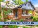 Charming brick home featuring a cozy front porch with stylish seating and a lush landscaped yard at 510 Wiley Ave, Salisbury, NC 28144