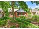 Charming brick home with beautifully landscaped yard and inviting front porch at 510 Wiley Ave, Salisbury, NC 28144