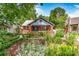 Charming brick home features a lush landscaped front yard with walkway and covered porch at 510 Wiley Ave, Salisbury, NC 28144