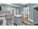Spacious kitchen with a center island, stainless steel appliances, and access to other rooms at 510 Wiley Ave, Salisbury, NC 28144