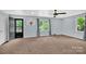 Living room with carpet, natural light and access to a deck via door at 510 Wiley Ave, Salisbury, NC 28144