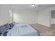 Clean bedroom with neutral carpet, natural light and views to the outside at 5207 Maynard Hill Dr, Monroe, NC 28110