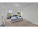 Serene bedroom showcasing natural light, and a ceiling fan at 5207 Maynard Hill Dr, Monroe, NC 28110