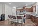 Kitchen featuring island with barstool seating, stainless appliances, and modern finishes at 5207 Maynard Hill Dr, Monroe, NC 28110