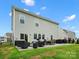 Spacious backyard with a patio, outdoor seating, and a grassy lawn perfect for entertaining at 5581 Soft Shell Dr, Lancaster, SC 29720