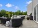 Relaxing patio area with wicker seating, offering a serene outdoor living space at 5581 Soft Shell Dr, Lancaster, SC 29720