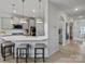 Modern kitchen featuring stainless steel appliances, pendant lights, and a breakfast bar at 5581 Soft Shell Dr, Lancaster, SC 29720