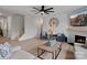 Bright open living room with fireplace, hardwood flooring, and comfortable seating at 5581 Soft Shell Dr, Lancaster, SC 29720