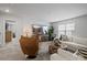 Bright living room with neutral walls, a sectional sofa, and a comfortable chair at 5581 Soft Shell Dr, Lancaster, SC 29720