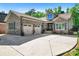 Beautiful brick home featuring a two-car garage and well-maintained landscaping at 6010 Albiza Dr, Harrisburg, NC 28075