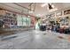 Spacious garage with ample storage and a workshop area, perfect for car enthusiasts at 6010 Albiza Dr, Harrisburg, NC 28075