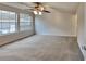Large bedroom with neutral carpet and multiple windows offering plenty of natural light at 6020 Gray Gate Ln # I, Charlotte, NC 28210