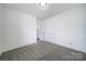 Spacious bedroom features neutral carpeting and double door closet at 6021 Piscataway Ct, Rock Hill, SC 29732