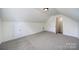 This bedroom features neutral paint, carpeting, and closet space at 6021 Piscataway Ct, Rock Hill, SC 29732