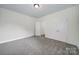 Spacious bedroom features neutral carpeting and double door closet at 6021 Piscataway Ct, Rock Hill, SC 29732