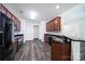 This open kitchen features stainless steel appliances, granite countertops, and hardwood floors at 6021 Piscataway Ct, Rock Hill, SC 29732