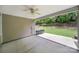 Covered patio with ceiling fan and view of the landscaped backyard at 6021 Piscataway Ct, Rock Hill, SC 29732