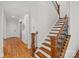 An entryway featuring a staircase with hardwood treads and iron railing at 6171 Willow Farm Dr, Denver, NC 28037