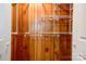 Closet is fitted with adjustable shelving and wood paneling at 619 E Sanders Rd, Shelby, NC 28150