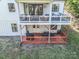 Spacious backyard features a two-story deck with outdoor seating areas at 685 Knollcrest Ne Dr, Concord, NC 28025