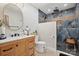 Modern bathroom with a marble vanity, a toilet, and a beautifully tiled walk-in shower with a shower bench at 685 Knollcrest Ne Dr, Concord, NC 28025