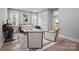 Cozy living room with sofa, chairs, desk, and decor at 685 Knollcrest Ne Dr, Concord, NC 28025