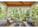 Enjoy the view from this comfortable screened-in porch at 685 Knollcrest Ne Dr, Concord, NC 28025