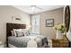 Cozy bedroom with a comfortable bed, natural light, and stylish decor at 7324 Jolly Brook Dr, Charlotte, NC 28215
