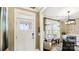 Welcoming foyer with a white front door and views of a bright sitting area at 7324 Jolly Brook Dr, Charlotte, NC 28215