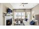 Bright living room with fireplace, large windows, and comfortable seating at 7324 Jolly Brook Dr, Charlotte, NC 28215