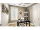 Cozy office space with lots of natural light from the window and stylish decor at 7324 Jolly Brook Dr, Charlotte, NC 28215
