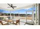 Relaxing screened-in porch with comfortable seating and a view of the outdoors at 7324 Jolly Brook Dr, Charlotte, NC 28215