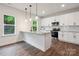 Modern kitchen with granite countertops, stainless steel appliances, and classic subway tile backsplash at 746 Shasta Nw St, Concord, NC 28027
