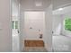 A glimpse into the convenient and spacious laundry room with easy access and ample storage space at 746 Shasta Nw St, Concord, NC 28027