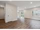 Bright living room boasts recessed lighting, hardwood floors, and slider to the back yard at 746 Shasta Nw St, Concord, NC 28027