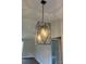 Pendant lighting casts a warm glow over a room, highlighting the contemporary design at 8222 Madison Ln, Hickory, NC 28602