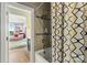 Bathroom with a shower/tub featuring decorative curtains at 8514 Ellington Park Dr, Charlotte, NC 28277