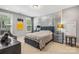 Serene bedroom featuring ample natural light and modern decor at 8514 Ellington Park Dr, Charlotte, NC 28277