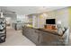 Open living room featuring a comfortable couch, modern lighting, and stylish decor at 8514 Ellington Park Dr, Charlotte, NC 28277