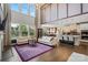Open-concept living space with hardwood floors, high ceilings, and a modern kitchen at 8514 Ellington Park Dr, Charlotte, NC 28277